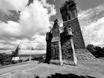Black and white photo of the Scottish Hero Willam wallace, build on the top of the hill overlooking Stirling Valley