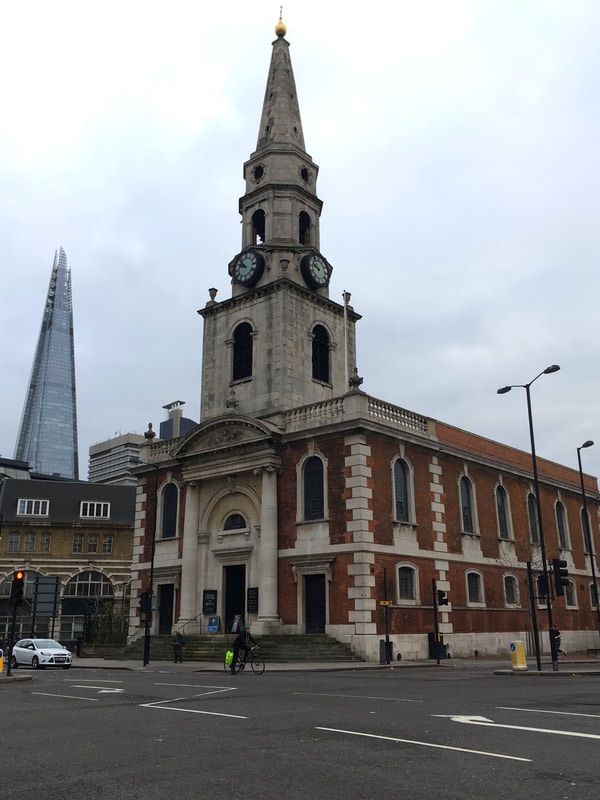 Photo of the St George the Martyr church, with the Shard visible in the background